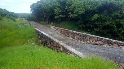 After, construction of private road in private subdivision, Haiku HI, with installation of 2 culverts with rock head walls.